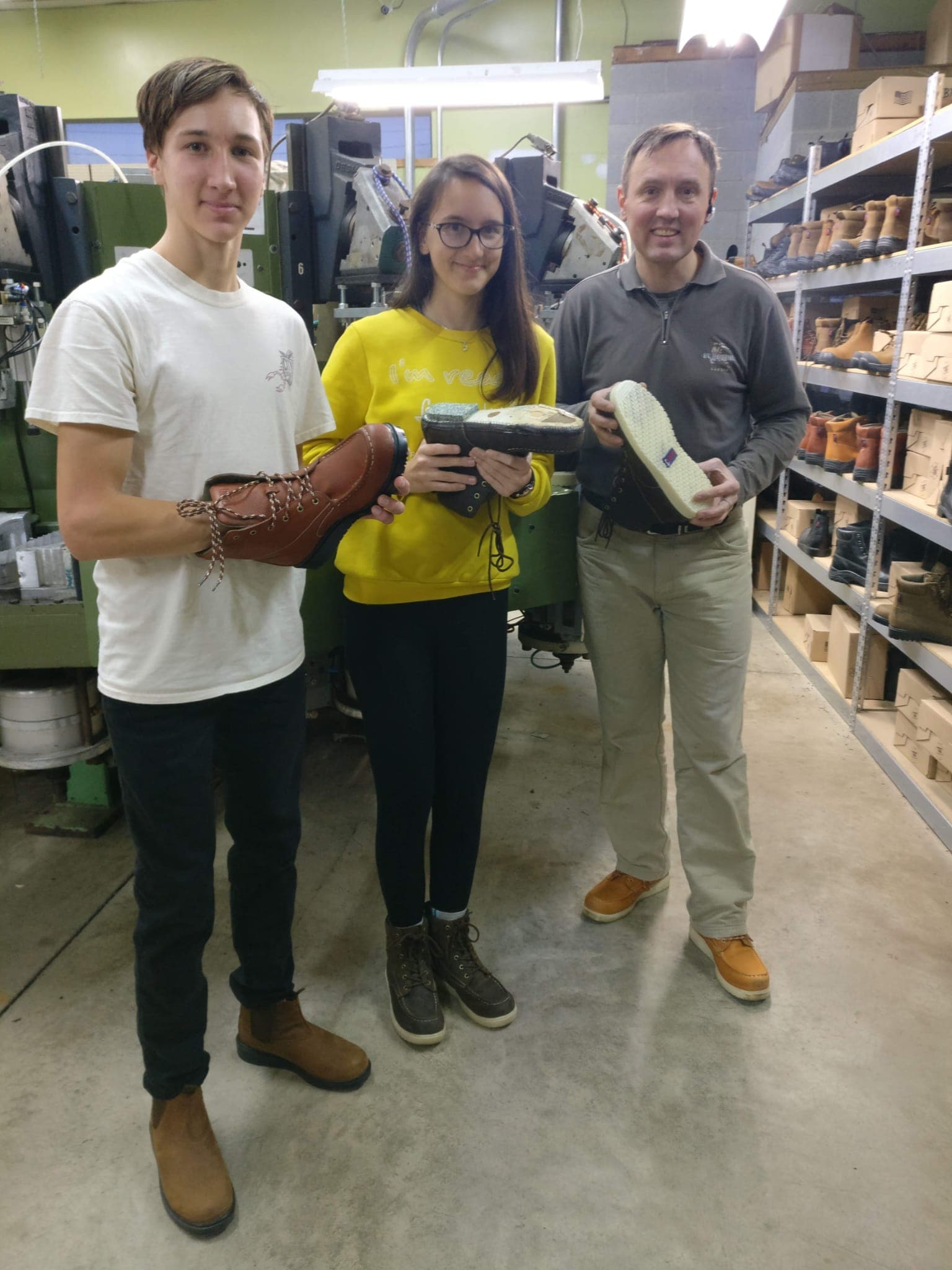 Petr Kovarik and his children on the Liberty Footwear factory floor in Grand Rapids, Michigan