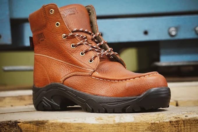 Liberty Footwear hiker boot on wooden planks